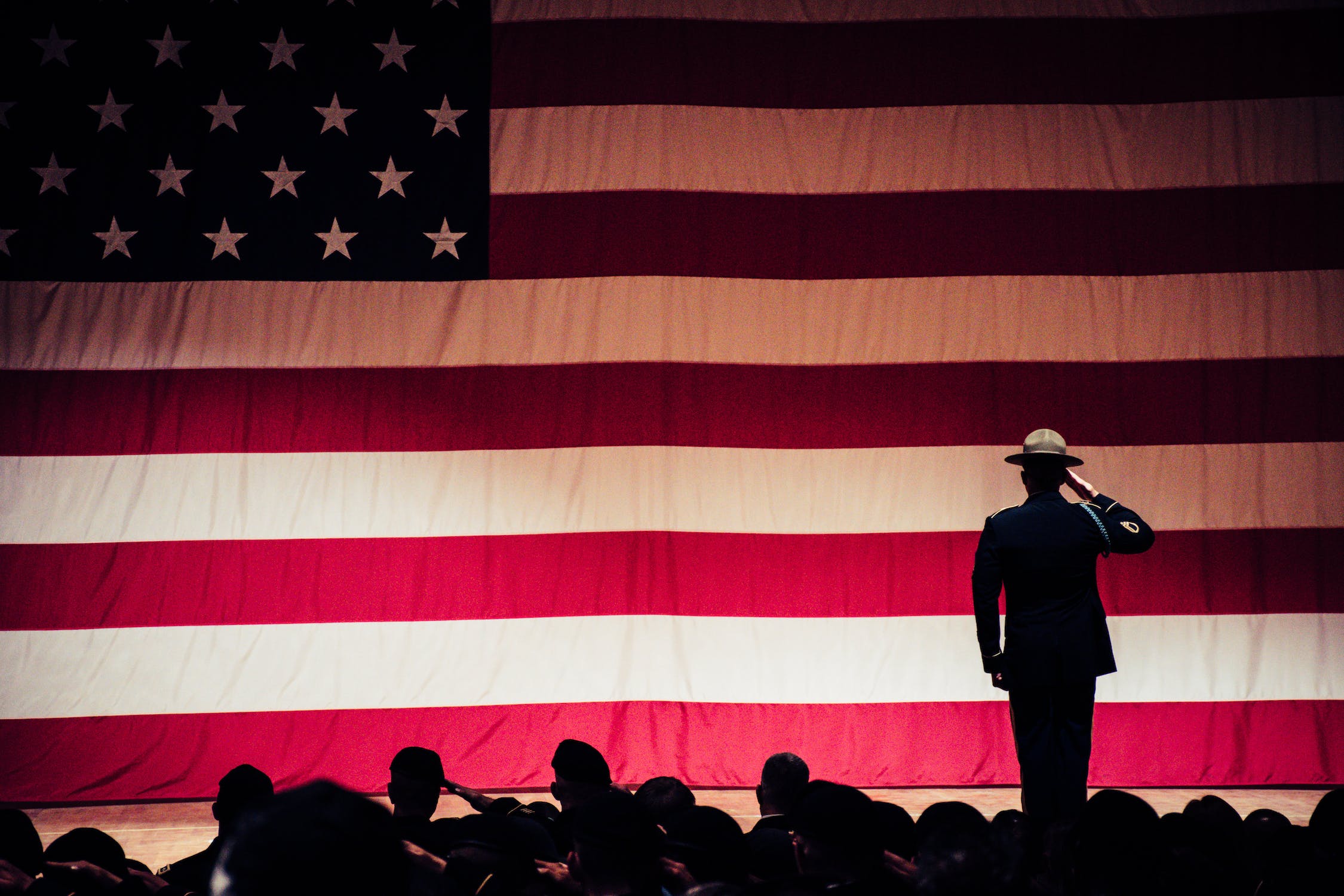 veteran flag saluting